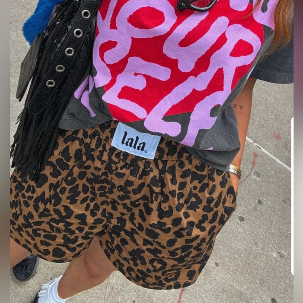 Dressed in LALA Leopard boxer shorts